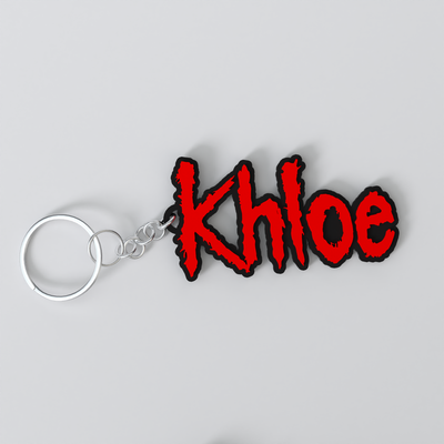 Custom Korn keychain with a personalised name in the band's logo lettering, made from durable PLA
