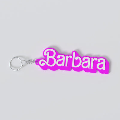 Custom Barbie-inspired keychain with a personalised name in bold pink lettering, made from durable PLA