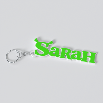 Custom Shrek-inspired keychain with a personalised name, made from durable PLA