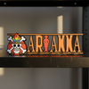 Personalized one piece nameplate with the Ace jolly roger on a shelf